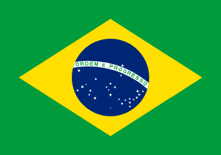 The flag of Brazil has a green field with a large yellow rhombus in the center. Within the rhombus is a dark blue globe with twenty-seven small five-pointed white stars depicting a starry sky and a thin white convex horizontal band inscribed with the national motto 'Ordem e Progresso' across its center.
