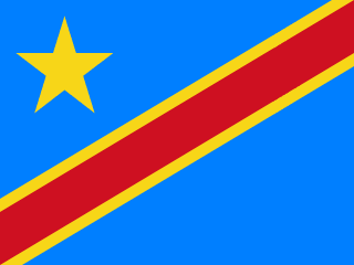 The flag of the Democratic Republic of the Congo has a sky-blue field with a yellow-edged red diagonal band that extends from the lower hoist-side corner to the upper fly-side corner of the field. A large five-pointed yellow star is situated above the diagonal band on the upper hoist side of the field.