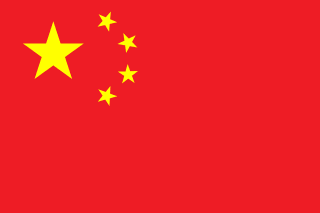 The flag of China has a red field. In the canton are five yellow five-pointed stars — a large star and four smaller stars arranged in a vertical arc on the fly side of the large star.