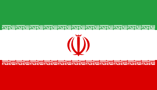 The flag of Iran is composed of three equal horizontal bands of green, white and red. A red emblem of Iran is centered in the white band and Arabic inscriptions in white span the bottom edge of the green band and the top edge of the red band.