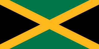 The flag of Jamaica is divided by a gold diagonal cross into four alternating triangular areas of green at the top and bottom, and black on the hoist and fly sides