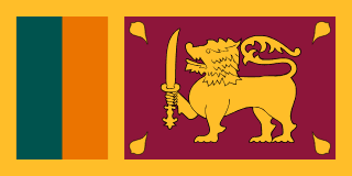 The flag of Sri Lanka features two large adjacent but separate rectangular areas, centered on a golden-yellow field. The smaller hoist-side rectangle is divided into two equal vertical bands of teal and orange, and the larger fly-side rectangle is maroon with a centered golden-yellow lion holding a Kastane sword in its right fore-paw and four golden-yellow Bo leaves, one in each corner.