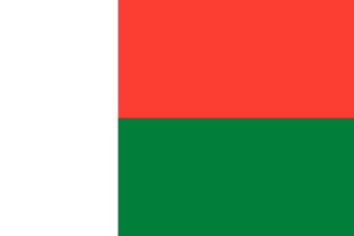 The flag of Madagascar features a white vertical band on the hoist side that takes up about one-third the width of the field, and two equal horizontal bands of red and green adjoining the vertical band.