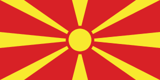 The flag of North Macedonia has a red field, at the center of which is a golden-yellow sun with eight broadening rays that extend to the edges of the field.