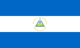 The flag of Nicaragua is composed of three equal horizontal bands of blue, white and blue, with the national coat of arms centered in the white band.