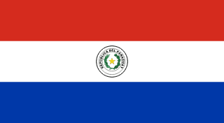 The flag of Paraguay features three equal horizontal bands of red, white and blue, with an emblem centered in the white band. On the obverse side of the flag depicted, this emblem is the national coat of arms.